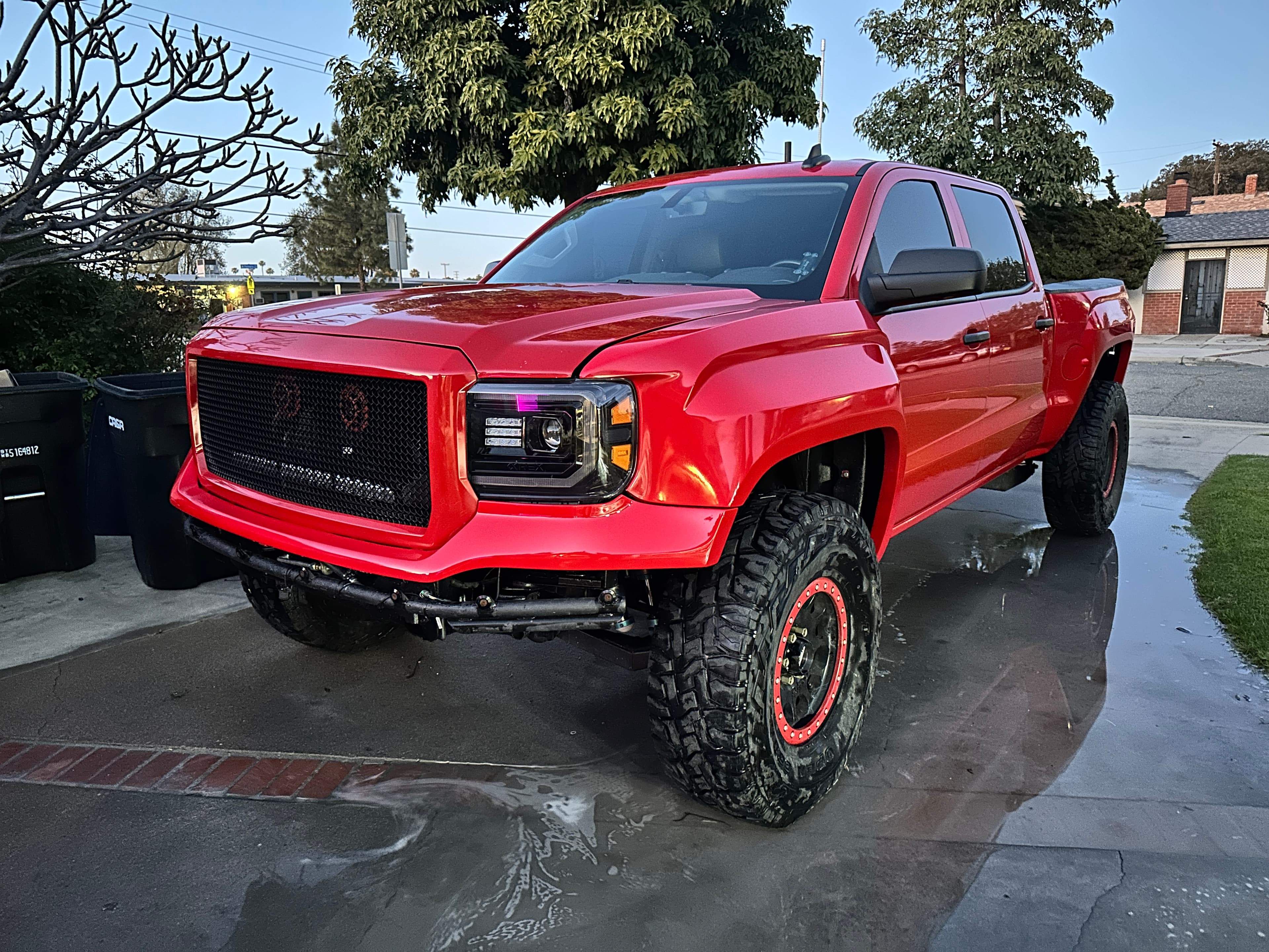 The founder's red GMC Sierra, the TuneView test vehicle used for real calibration data